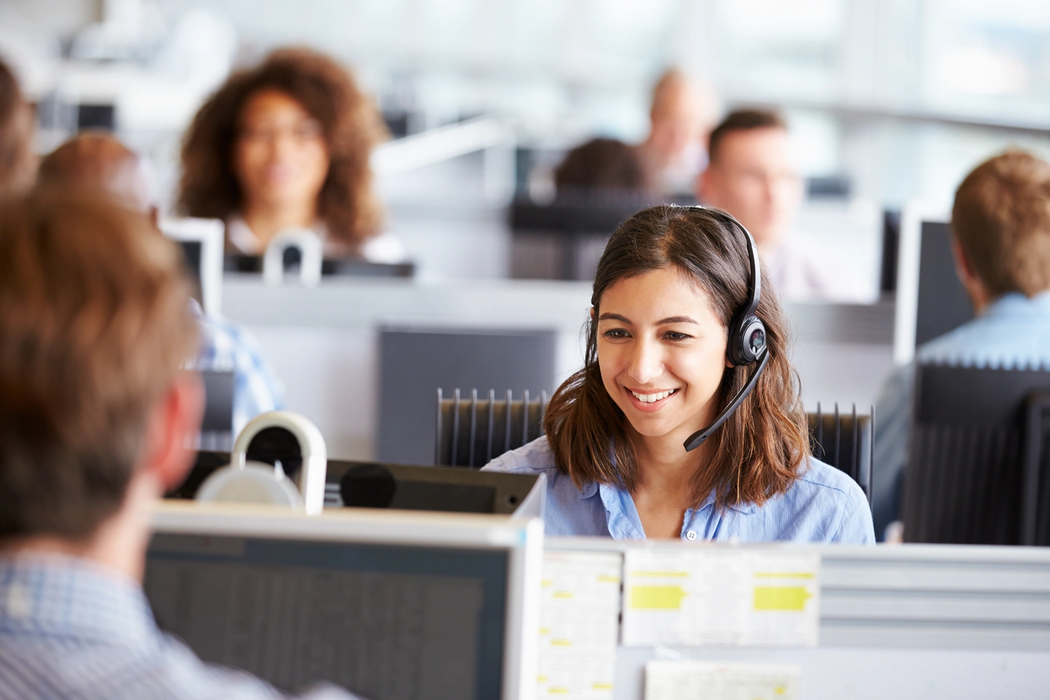 Employee at call center providing solution for customer