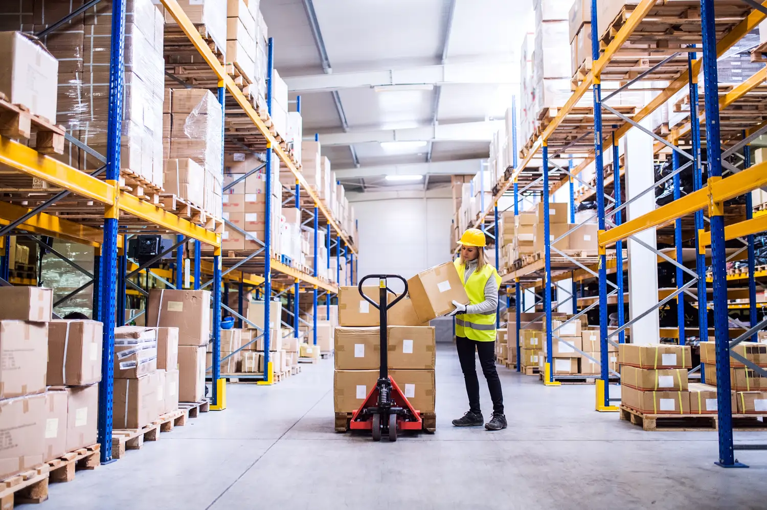 Employee conducting distribution operations at a manufacturing plant