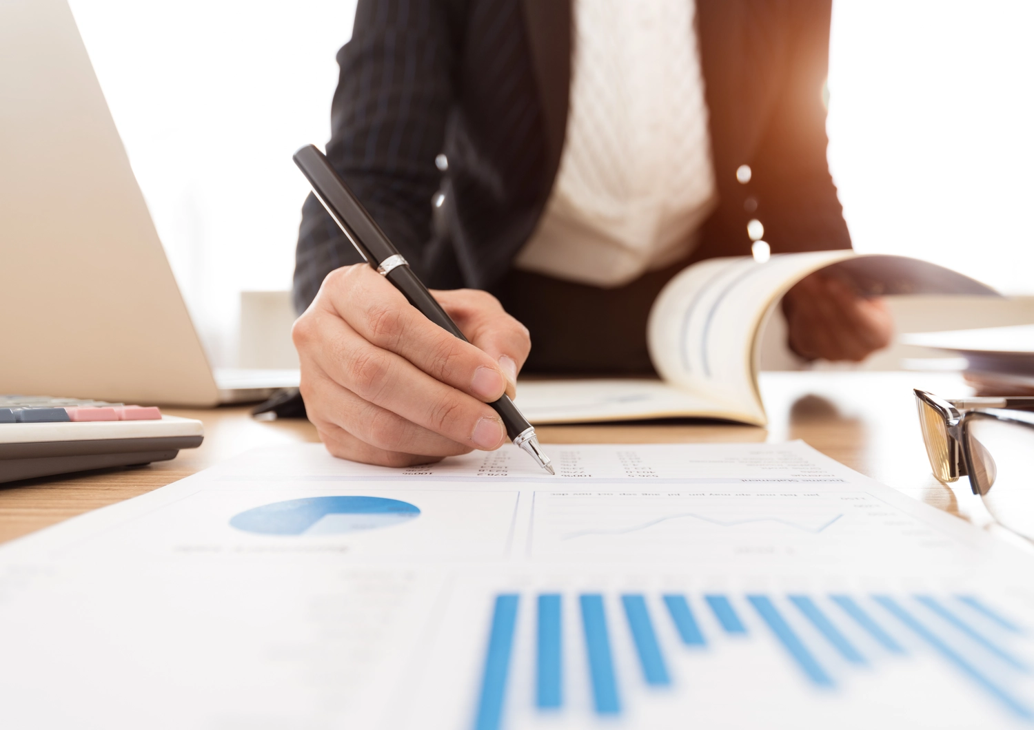 Employee reviewing lease administration audits
