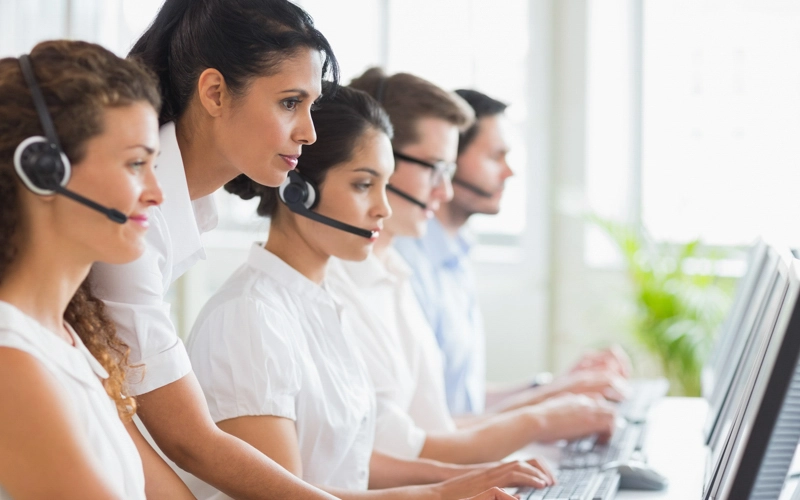 Shared service center employees providing solutions to their customers