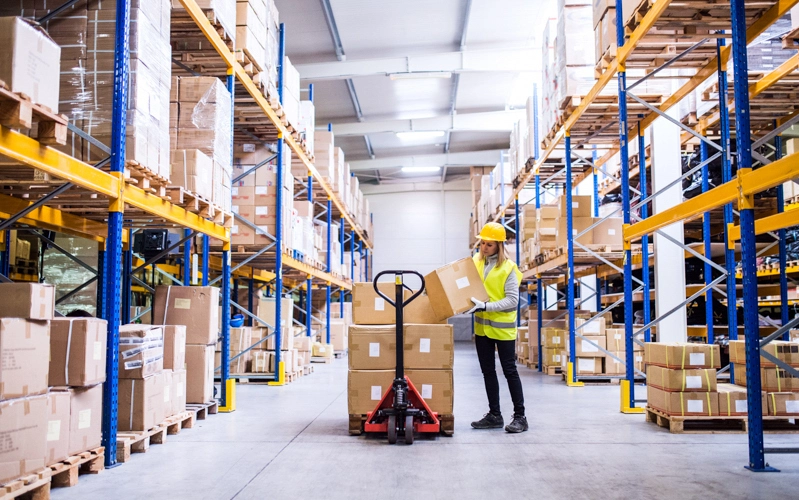 Employee conducting distribution operations at a manufacturing plant